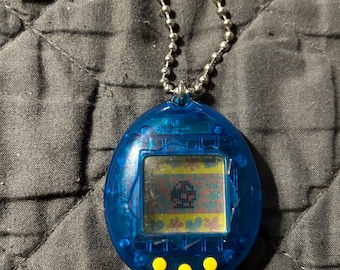 ヴィンテージ 1997 バンダイ たまごっち ツチ ピンク パープル カラー