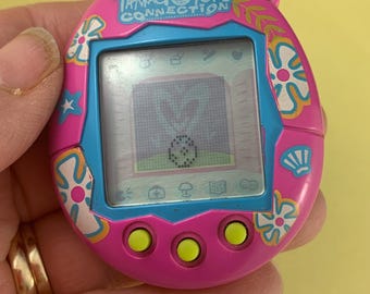 2004 Bandai Tamagotchi Connection Dark Fuchsia Pink With White and