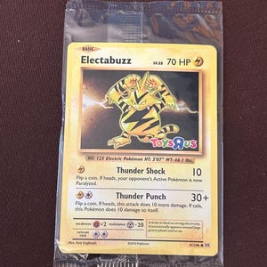 rare electabuzz pokemon card - 046//142 your opponents Active Pokemon is now Paralysed. Pokemon Trading Card Game Sun