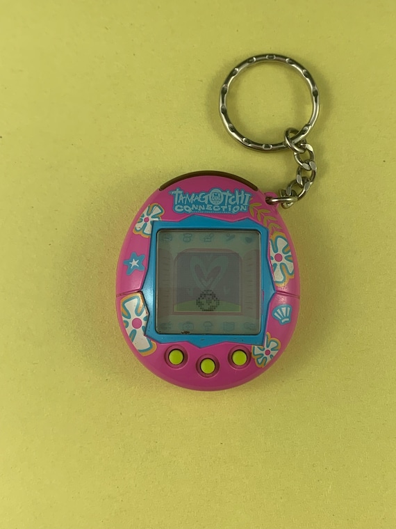 2004 Bandai Tamagotchi Connection Dark Fuchsia Pink With White and