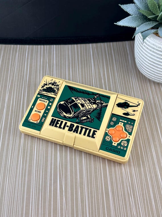Heli-Battle Casio ハンドヘルド ゲーム。CG 370 RARE Vintage 1987 Heli-battle Casio Handheld Game. CG 370 Works