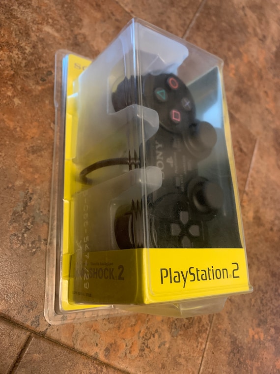 Manette Noire Avec Vibrations Pour PlayStation 2 (PS2) - Analogique - Neuf Générique