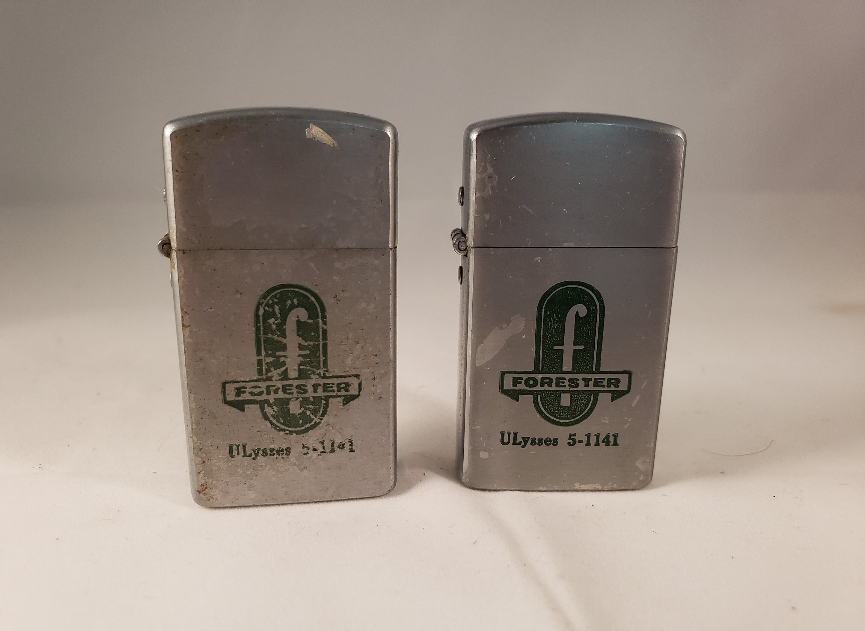 Pair of 2 Vintage Trimlite Champ Flip Lighters with Forester ULysses 5
