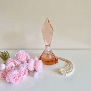 Vintage art-deco parfumflesje roze depressieglas, zwaar dik roze glazen parfumpotje