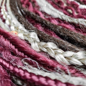 Mix of de se burgundy boho dreadlocks, curly dreads and braids Brown burgundy dreadlocks 
Mix of brown, blonde and burgundy boho-textured crochet double ended dreadlocks, curly dreads and de braids
Burgundy dreads extension
burgundy dreadful hippie