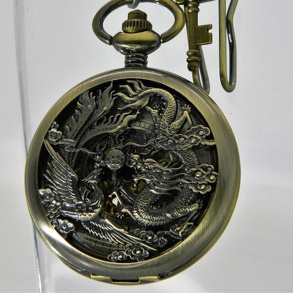 montre Dragon Phoenix mécanique automatique de poche et sa clef.