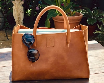handmade leather bag cognac leather used look design different colors handmade