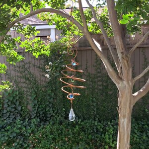 copper wind spinners hanging