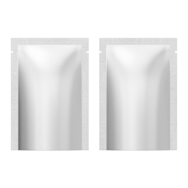 May include: Two white, sealed, rectangular sachets. Each sachet has a smooth, reflective surface and a textured border. The sachets are standing upright and are side by side. The sachets are likely for single-use products.