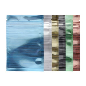 May include: Six stand-up pouches with zipper closures. The pouches are made of a shiny, metallic material and are available in blue, silver, gold, black, green, and rose gold.