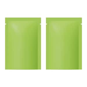 May include: Two vivid green, rectangular sachets with a smooth, glossy finish. Each sachet has a small notch at the top for easy opening. The sachets are side by side, and the background is plain white.