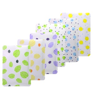 May include: Six different patterned pouches with a white background. The pouches have various patterns including leaves, polka dots, and geometric shapes. The pouches are made of a shiny, plastic-like material.