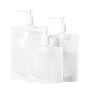 May include: Three white refillable pump bottles with clear plastic pouches. The bottles are made of white plastic and have a simple design.