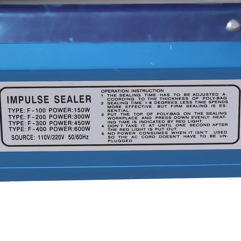 May include: Blue impulse sealer with a white label that reads "Impulse Sealer" and lists different types and power levels. The label also includes operating instructions for the sealer.