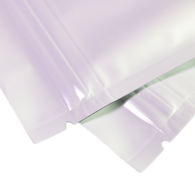 May include: Two clear, white, plastic stand-up pouches with a heat-sealed zipper closure.