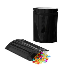 May include: Two black stand-up pouches with a silver zipper. One pouch is empty and the other is filled with colorful candy.