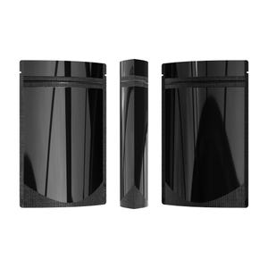 May include: Three black stand-up pouches with a zipper closure. The pouches are made of a shiny, metallic material and have a textured, black finish.