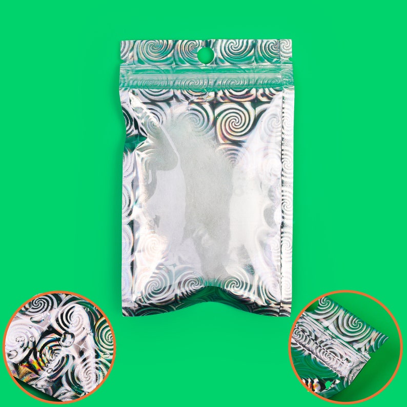 May include: A clear, resealable bag with a silver and green swirled pattern. The top edge has a green border and a small hole for hanging. The bag is empty and set against a bright green background.