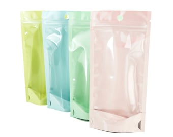 C303 - QQ Studio Multi-Color Water-Resistant Plastic Stand Strong™ Beauty Bag with Zipper Seal and Round Hang-Hole (100 Bags/Pack)