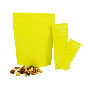 C129-46 - QQ Studio Yellow Glossy Foil Heat Seal Snack Bags With Matte Stand Up Bags for Food (Pack of 200 Bags + Bonus)