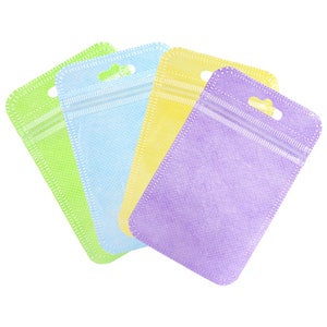 C236- Pack of 100 Clear Front w/ Pastel Color Non-Woven Material Zip Seal Bags