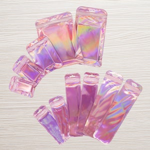 C2279 – Pack of 100 Clear with Pink Iridescent and Silver Holographic Flat Resealable QuickQlick® for Stationary, Jewelry, Beauty Repacking