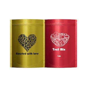 May include: Two food pouches. One is gold with a heart made of coffee beans and the text "Roasted with love." The other is red with a trail mix graphic and the text "Trail Mix" and "1oz."