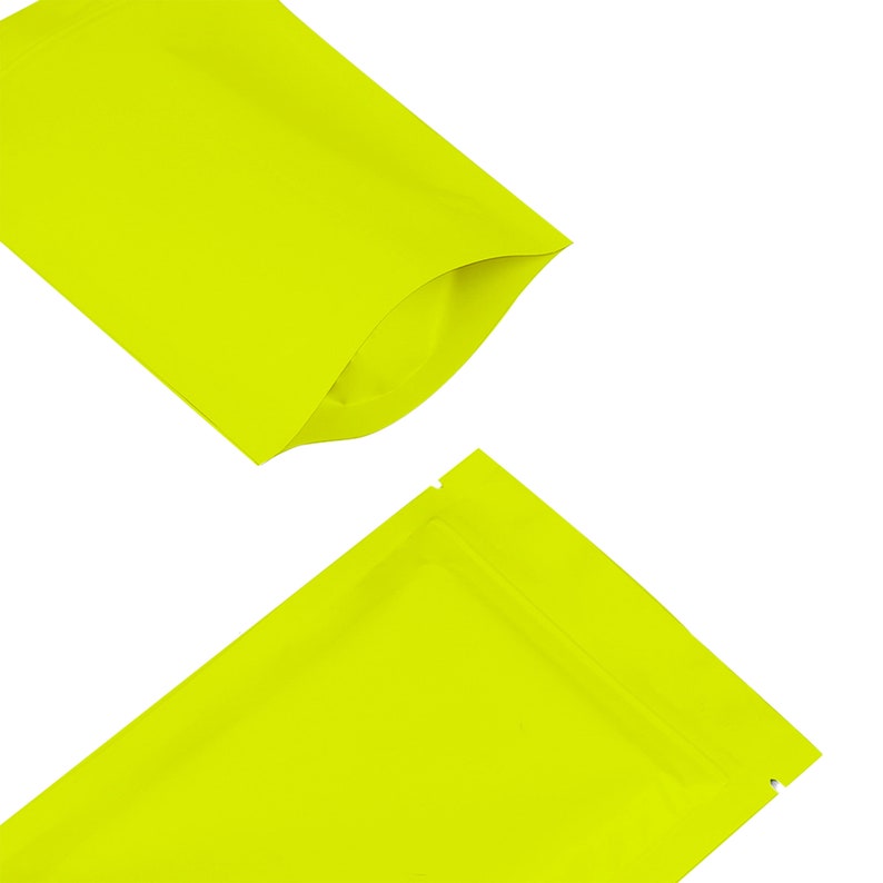 May include: Two yellow stand-up pouches with a zipper closure. The pouches are made of a shiny, metallic material.