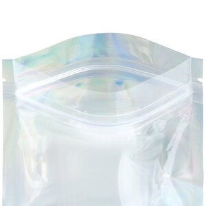 May include: A clear iridescent plastic resealable bag with a zipper closure.