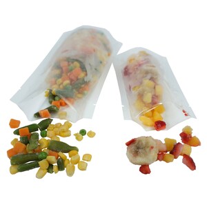 May include: Two clear plastic pouches with frozen food. The pouch on the left contains a mixture of green beans, corn, and carrots. The pouch on the right contains a mixture of strawberries, pineapple, and banana.