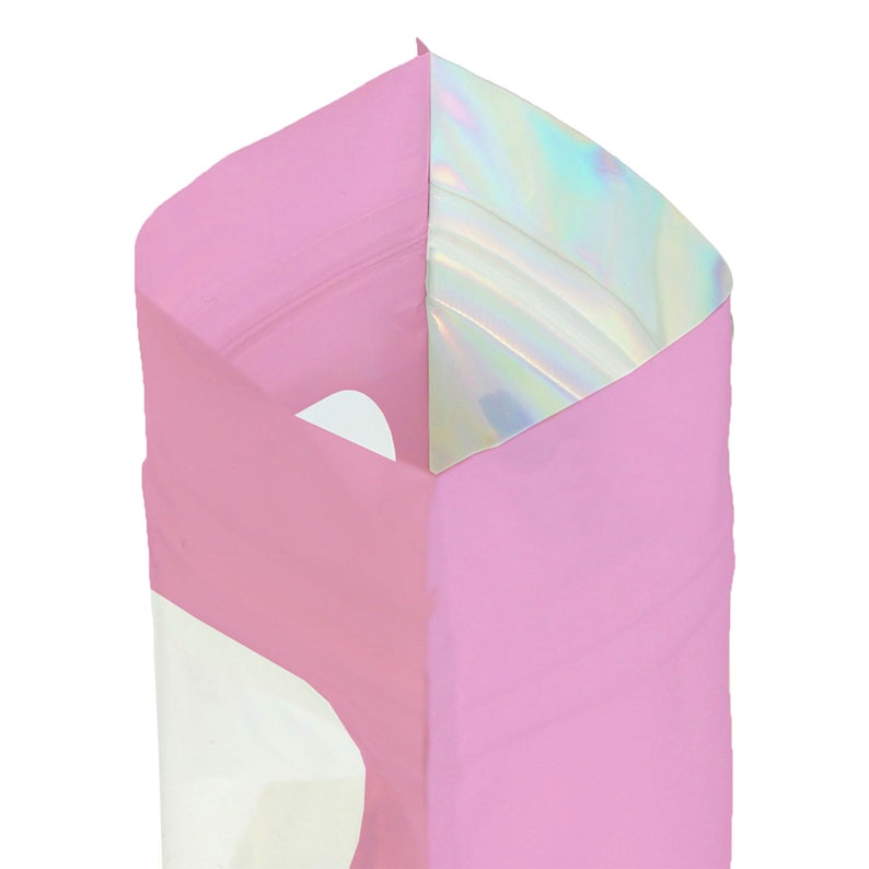 May include: Pink stand-up pouch with a holographic zipper. The pouch is partially open, revealing the inside of the pouch.
