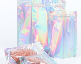 C375- 100 Holographic Windowed Metallic Film Packaging Bags with Water Resistant Lining, QuickQlick™ Seal for Beauty Personal Care Products
