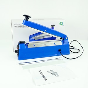 May include: Blue electric impulse sealer with a black cord and a white instruction manual. The sealer has a silver metal blade and a red power button. The manual has the text "Impulse Sealer" printed on it.