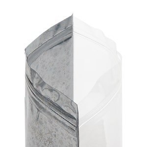 May include: A partially visible, clear plastic bag with a silver, star-patterned side. The bag has a zip-top closure and is designed for packaging. The clear side allows for product visibility, while the silver side adds a decorative element.