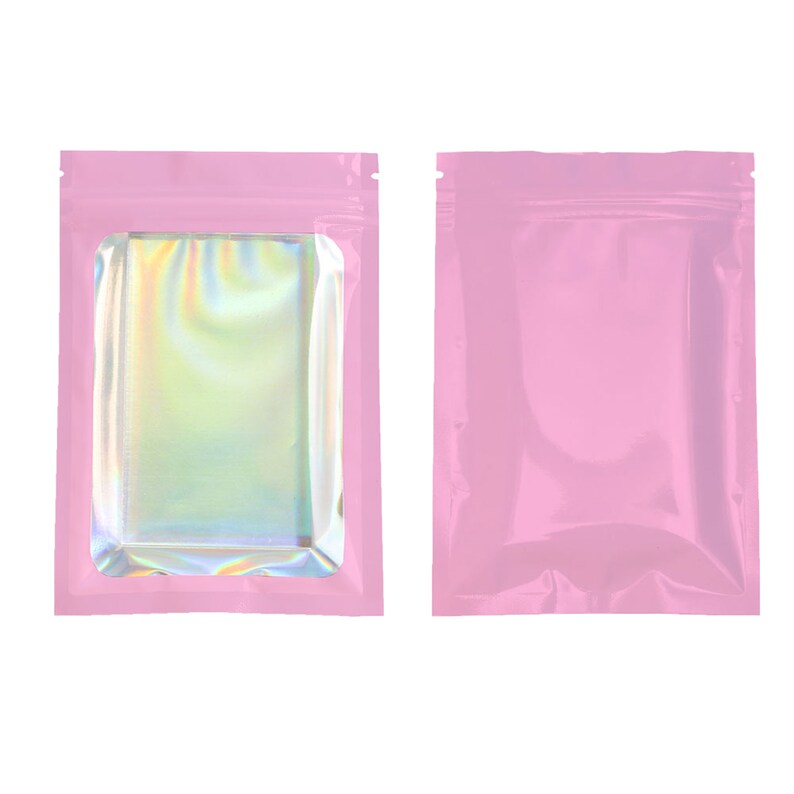 May include: Two pink stand-up pouches, one with a clear iridescent window and one without.