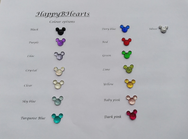 May include: A chart showing 14 different colors of glitter mouse ears. The colors are: black, purple, lilac, crystal, clear, sky blue, turquoise blue, dory blue, red, green, lime, yellow, baby pink, and dark pink.