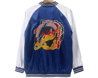 May include: A blue and white satin bomber jacket with an embroidered design of a phoenix on the back.