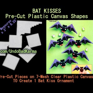 May include: Image features pre-cut plastic canvas shapes for crafting. The text reads "BAT KISSES" and "Pre-Cut Plastic Canvas Shapes." Includes measurements of 2.25" x 3" x 8.25". The image shows bat-shaped ornaments with purple wings. The text also says "4 Pre-Cut Pieces on 7-Mesh Clear Plastic Canvas TO Create 1 Bat Kiss Ornament."