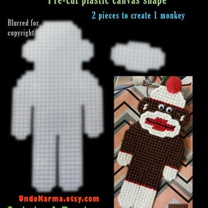 May include: A pre-cut plastic canvas shape of a sock monkey. The image shows two pieces, one for the body and one for the head. The finished product is a brown sock monkey with a red nose and white stripes. The text "Sock Monkey" is at the top of the image. The text "Pre-cut plastic canvas shape" is below the title. The text "2 pieces to create 1 monkey" is below the previous text. The text "UndoKarma.etsy.com" is at the bottom of the image. The text "Original Designs by Danita Crawford ©2024" is below the previous text.
