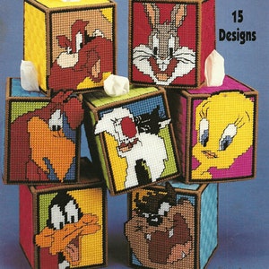 Image showing 7 Looney Tune tissue boxes. Tweety, Sylvester, Tasmanian Devil, Bugs Bunny and more.