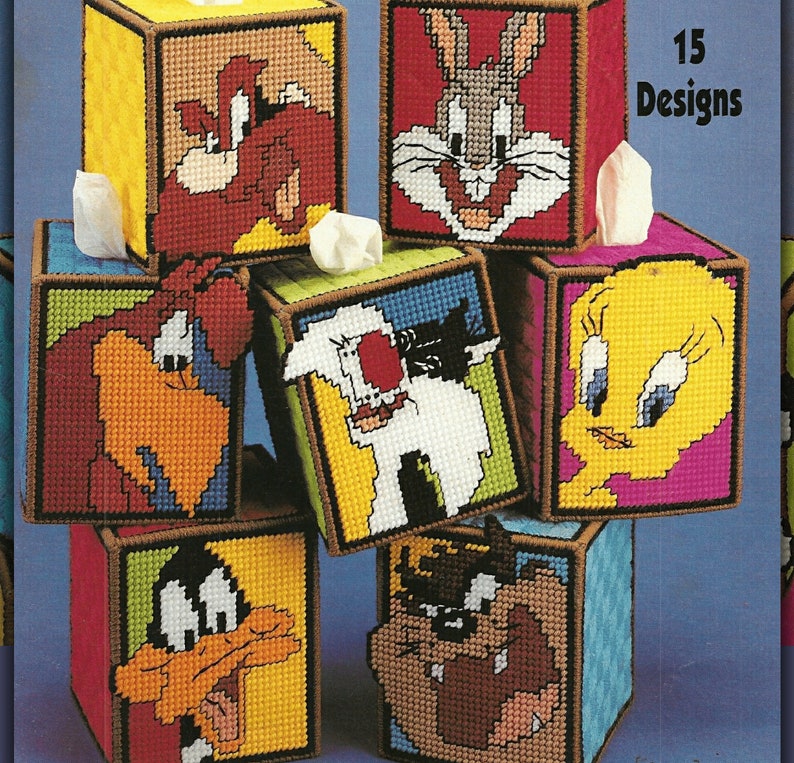Image showing 7 Looney Tune tissue boxes. Tweety, Sylvester, Tasmanian Devil, Bugs Bunny and more.