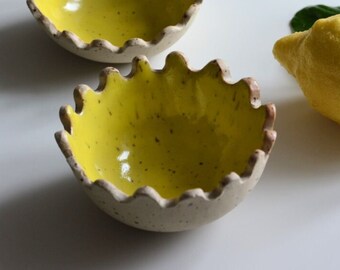 Set of glazed stoneware bowls with decorated rim