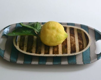 Set of striped stoneware trays