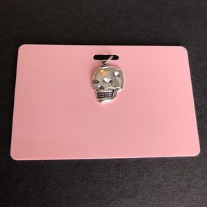 Xray Marker Holder With Oblique Skull Charm