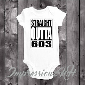 May include: White baby onesie with black text that reads "STRAIGHT OUTTA 603".