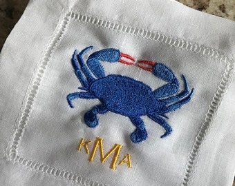 Manteles bordados con cangrejo azul