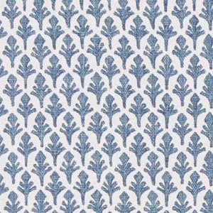 May include: A white fabric with a repeating pattern of blue stylised floral designs.