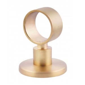 May include: A gold metal curtain rod finial with a round base and a ring on top. The finial is designed to be used as a decorative end piece for a curtain rod.