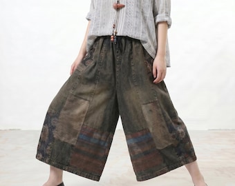 Pantaloni culotte in denim patchwork, pantaloni a gamba larga lavati e consumati, jeans cropped oversize con elastico in vita, pantaloni in denim casual boho