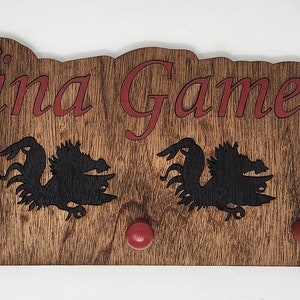Custom College of South Carolina Gamecocks Laser cut Wooden 5 peg Hat Rack. Multi-layered painted hat rack.
